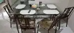 4 seeter glass top iron dining table
