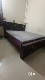 Selling one year old Bed and cot