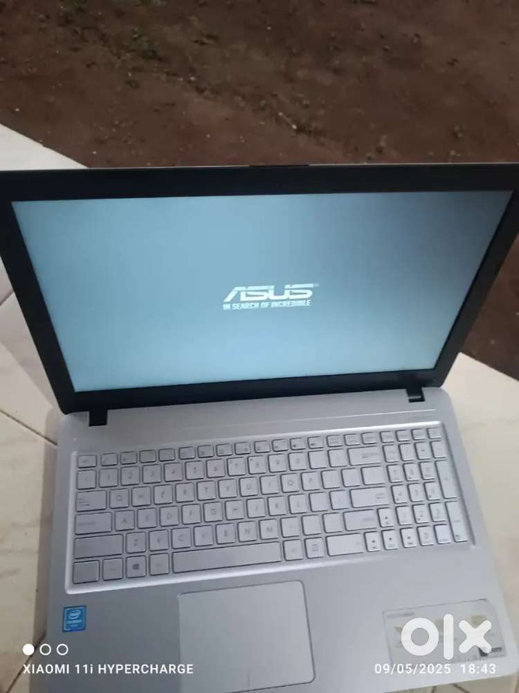 ASUS  LAPTOP 4 GP RAM 1000 GP HDD WIFI WEBCAM INTEL CELERION PROCESSOR