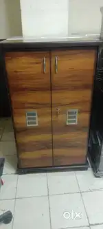 Space saving design particle wood shoe rack feature a space saving des