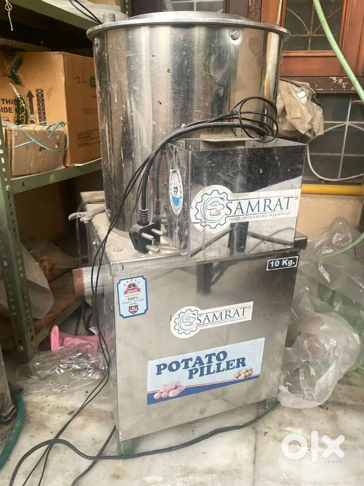 Potato piller, peeler for chips, french fries, stainless steel body.