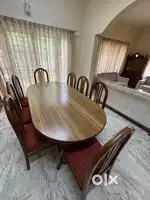 Teak wood dining set with 8 chairs