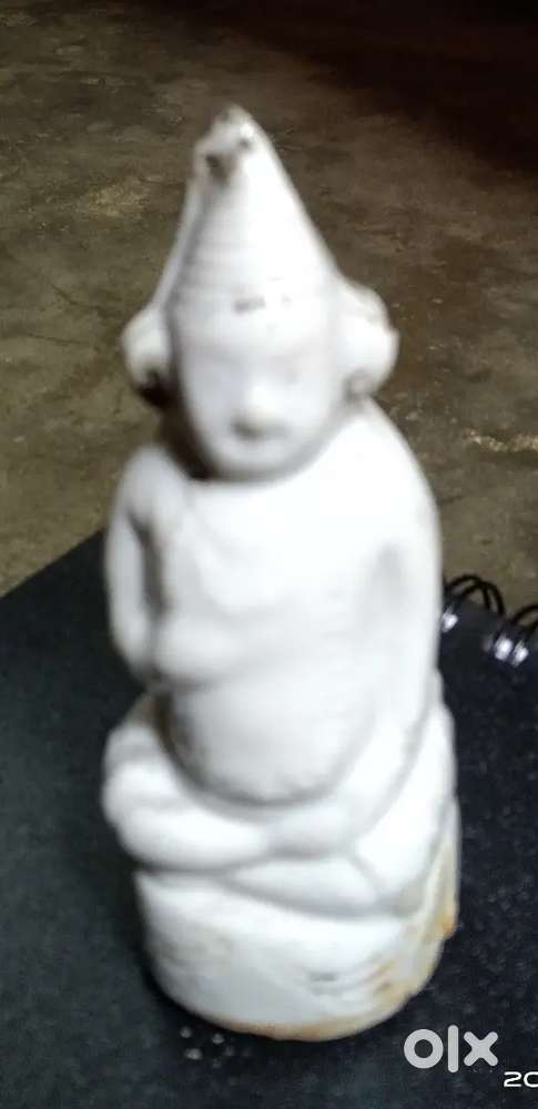 An antique doll of lord Shiva is for sale.