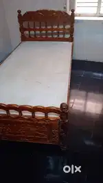 two wooden beds available each Rs.14,000