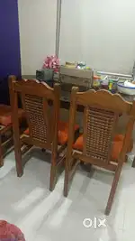 Old wooden 6 chair antique dining table with glass top
