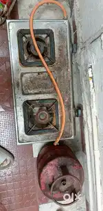 Gastove with cylinder and pipe is for sale