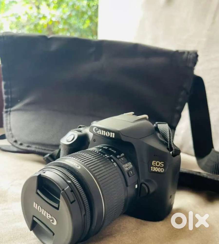 Canon 1300d with 2 lenses.