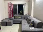 L-Shaped Sofa Set with Center Table & Cushions – Good Condition