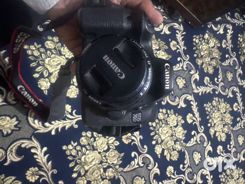 Canon 70d with 50mm1.8 and kit lens 18-55. Very less used almost new