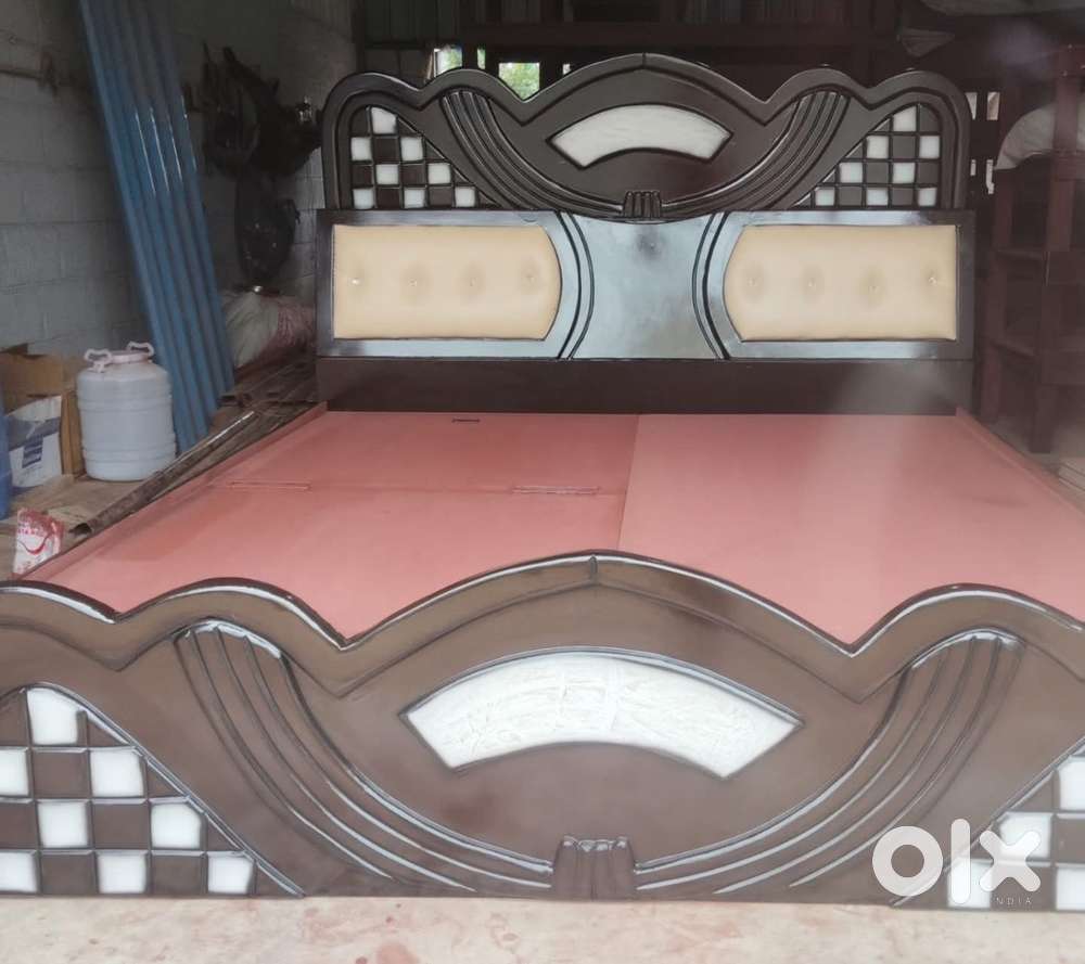 Band new luxury king size with storage and bottom storage cot