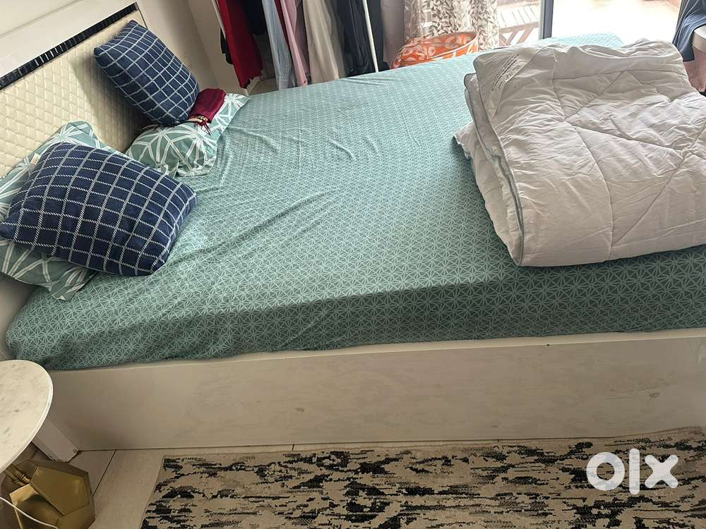 Queen size bed with side table