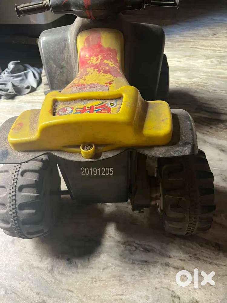 Kids battery 4 wheeler scooter