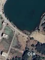 Looking For Perfect Land with Gow Mukhi landfront of lake & Mountain