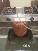 Gas  cylinder( with half gas )+ gas chulha 2 burner