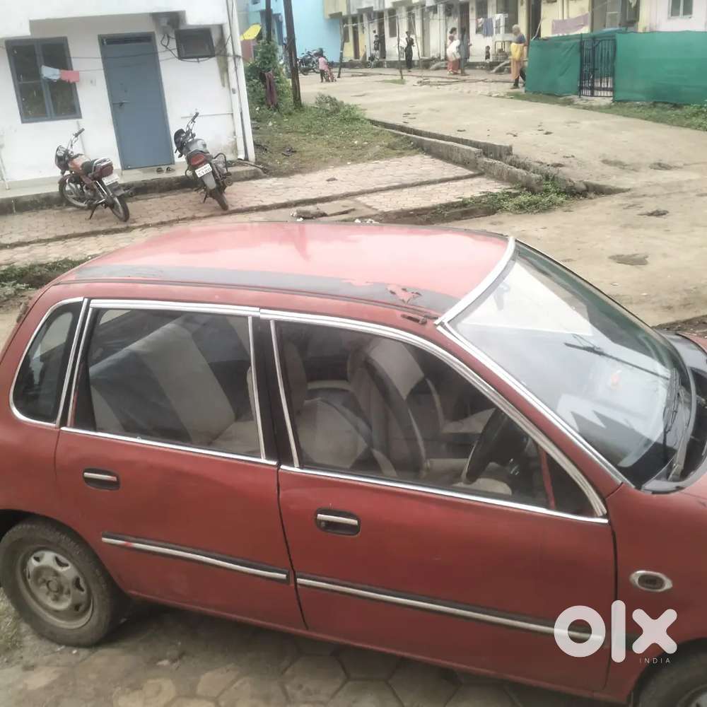 Maruti zen red colour good condition me hai lether seat cover