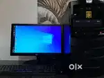 Circle Computer System With Monitor and Logitech keyboard, Mouse