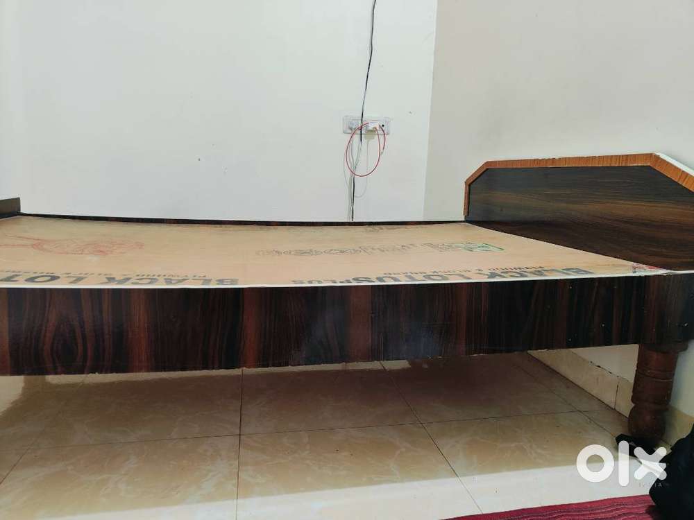Single wooden bed