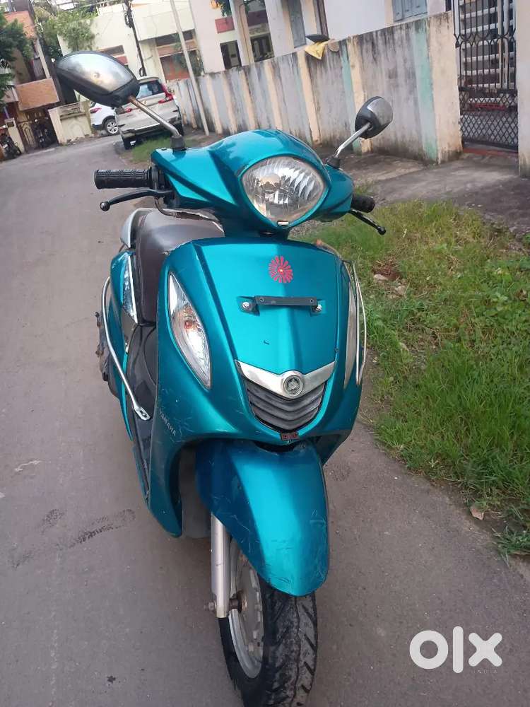 Lady teacher driven scooty
