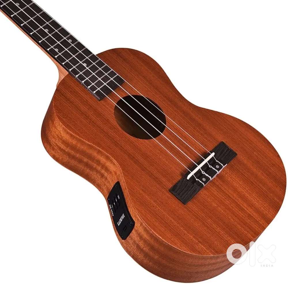 Ukulele of kadence company a Tuner a Carring Bag a pick