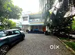10.5 CENT 2600 SQFT 4 BED ROOMS HOUSE IN ALUVA NEAR KADUNGALLUR