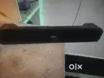 Neuton sound bar and digital clock with saibaba photo