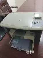 Printer in use  laser printer M1005 MFP