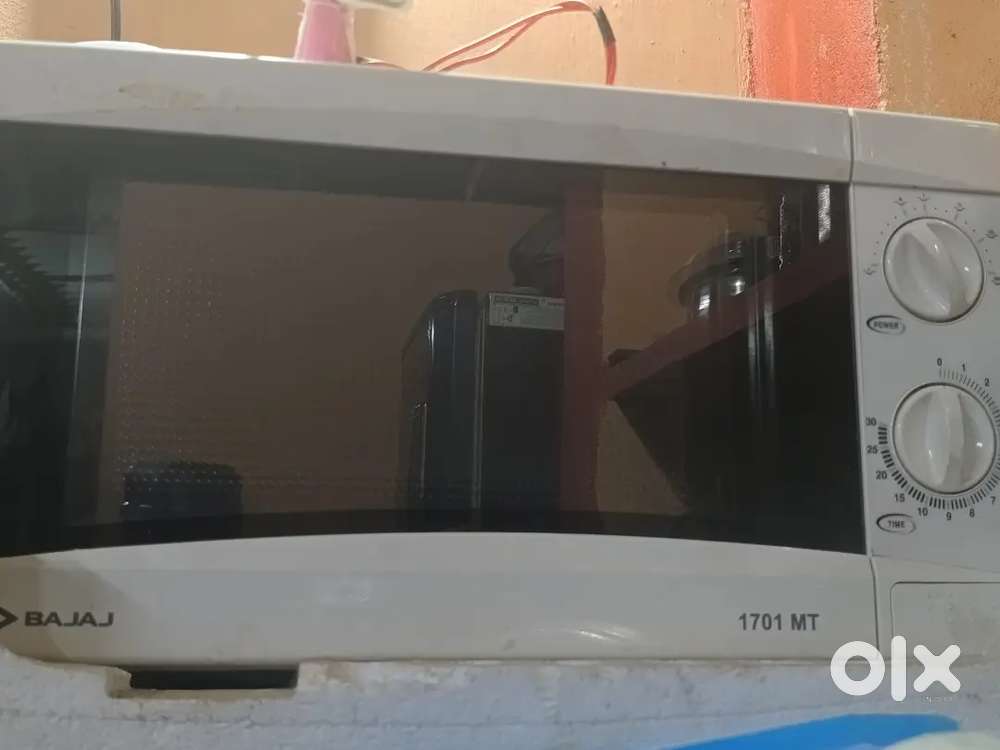 The product is Bajaj 1701 MT Solo Microwave oven white colour