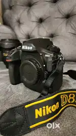 Nikon D850 with two lenses and a Godox flash