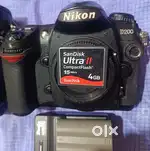 D200 Nikon body ,32gb CF card  , charger, battery               10000