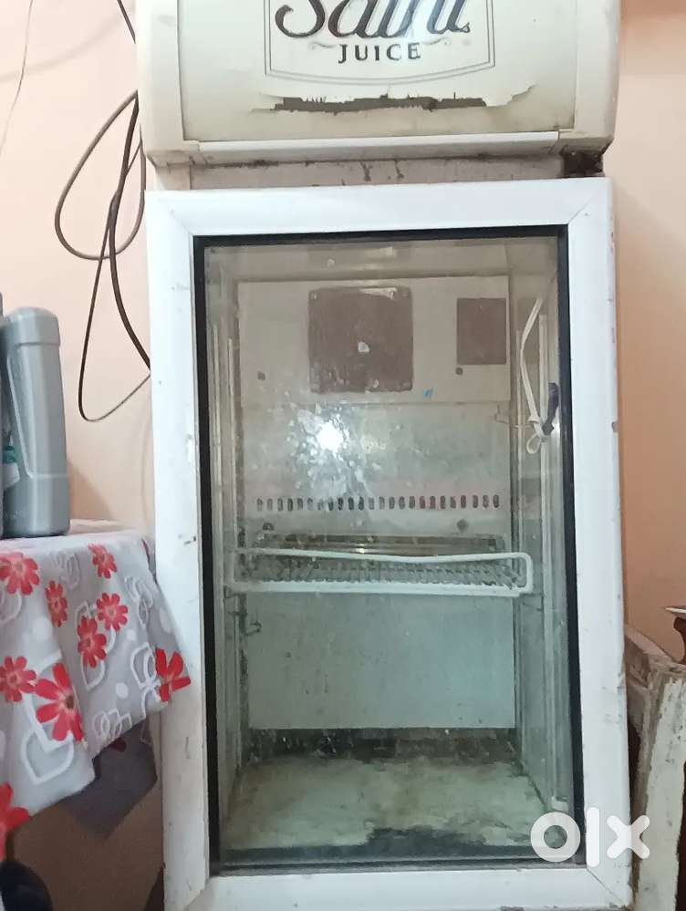 Two glass fridges