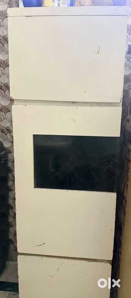 *Urgent sale* wooden cabinet cum almirah for  with 3 partitions.
