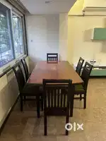 Melamine Top Dining Table with Six Cushioned Chairs