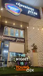 Team member in pizza outlet