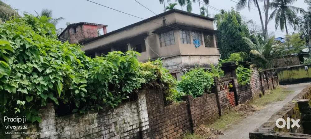 2 storied building, with 4 katta vacant land.