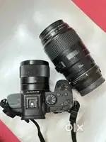 Sony 28mm f/2, canon 100mm f/2.8 and Sigma MC11 lens converter