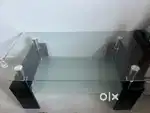 Glass centre table in a good condition at cheap rice
