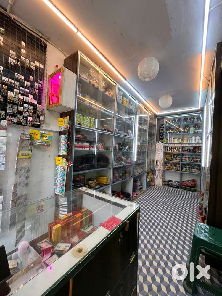 A running ladies corner for sale infront of tvs bike show room main ro