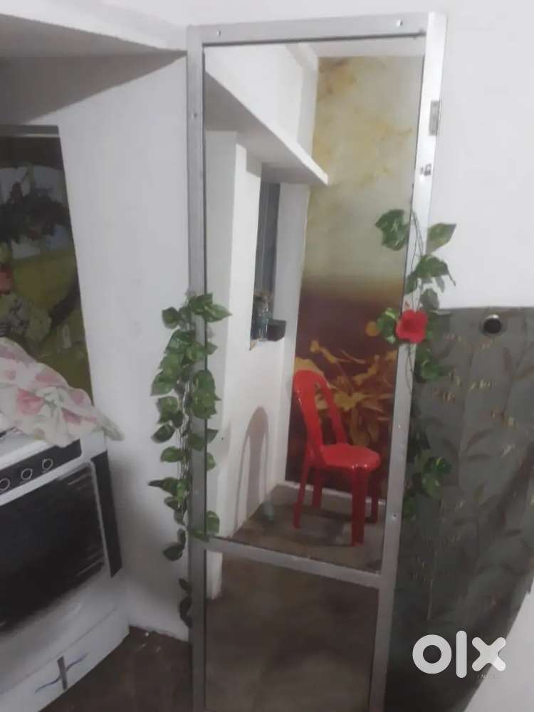 Wooden partition, mannequin, mirror, glass gate