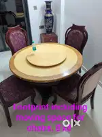Classically styled, marble top round dining table