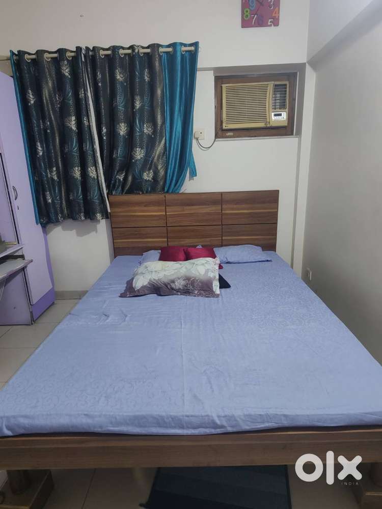 King size wooden bed