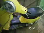 Yellow Vespa newly condition