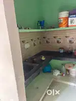 1 bedroom with attached bathroom and a kitchen