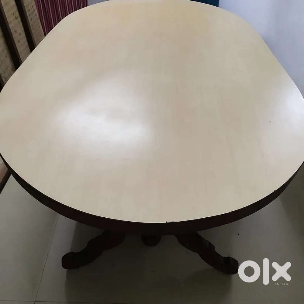 Teak dining table