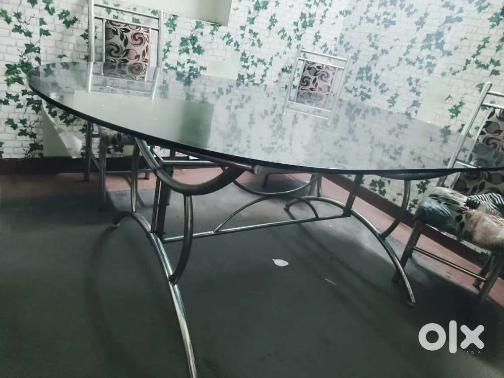 Glass dining table with chairs