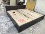 Unused new wooden double bed without storage available