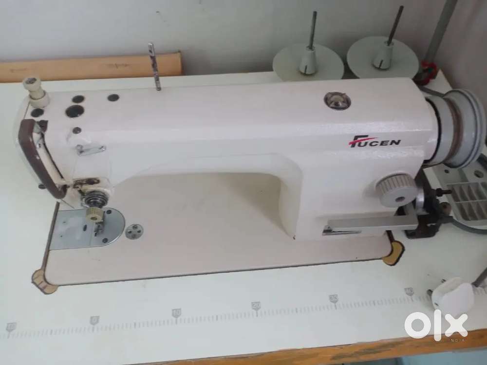 White sewing machine — 100% working condition.