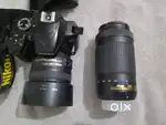 NIKON D3400 with 50mm 1.8 blur and 70-300mm lens kit