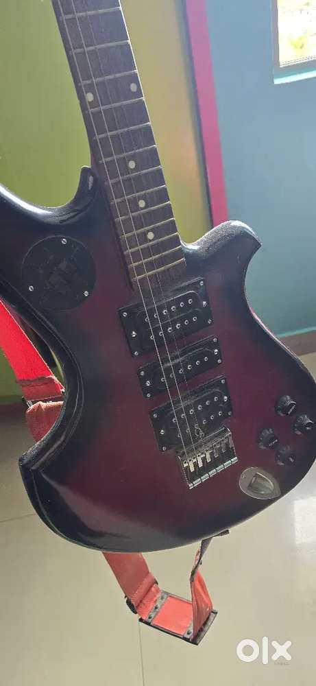 Electric guitar and acoustic guitar with amplifier