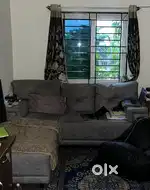 L-shaped 4 seater grey sofa