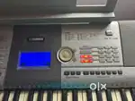 Original Yamaha keyboard player with kadance stand .